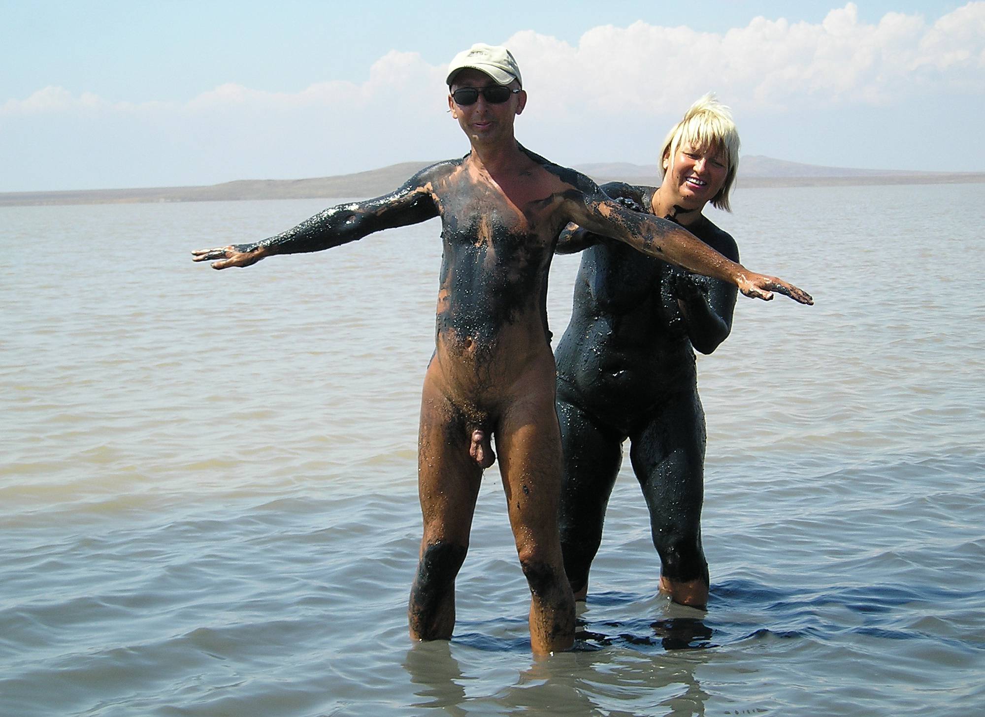 Young Nudists Dark Mud And Clear Water - 3