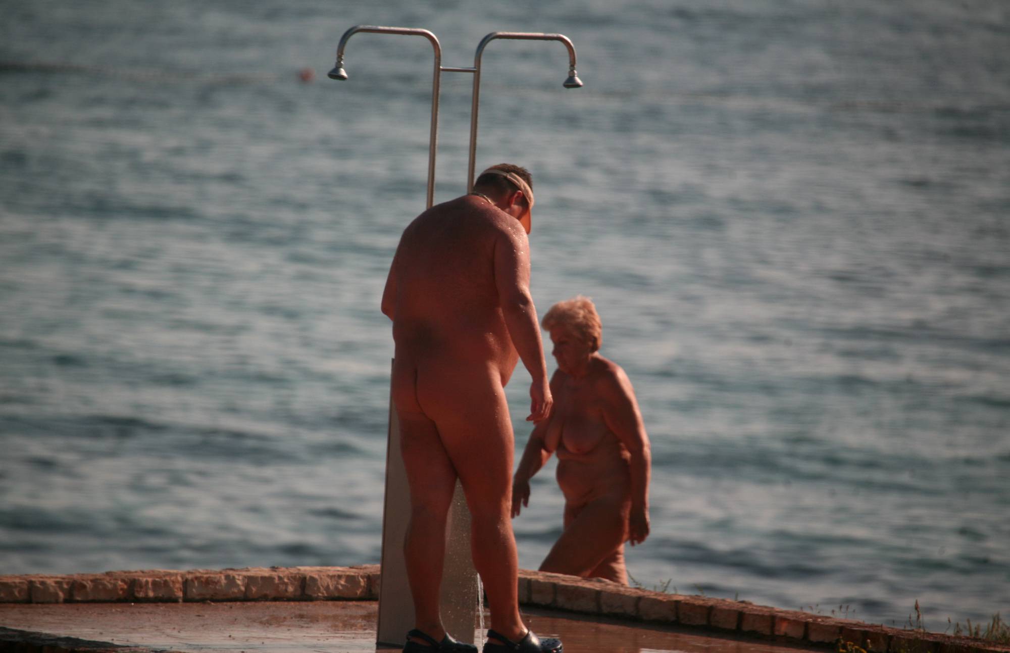 Naturist Shower at Dusk - 1