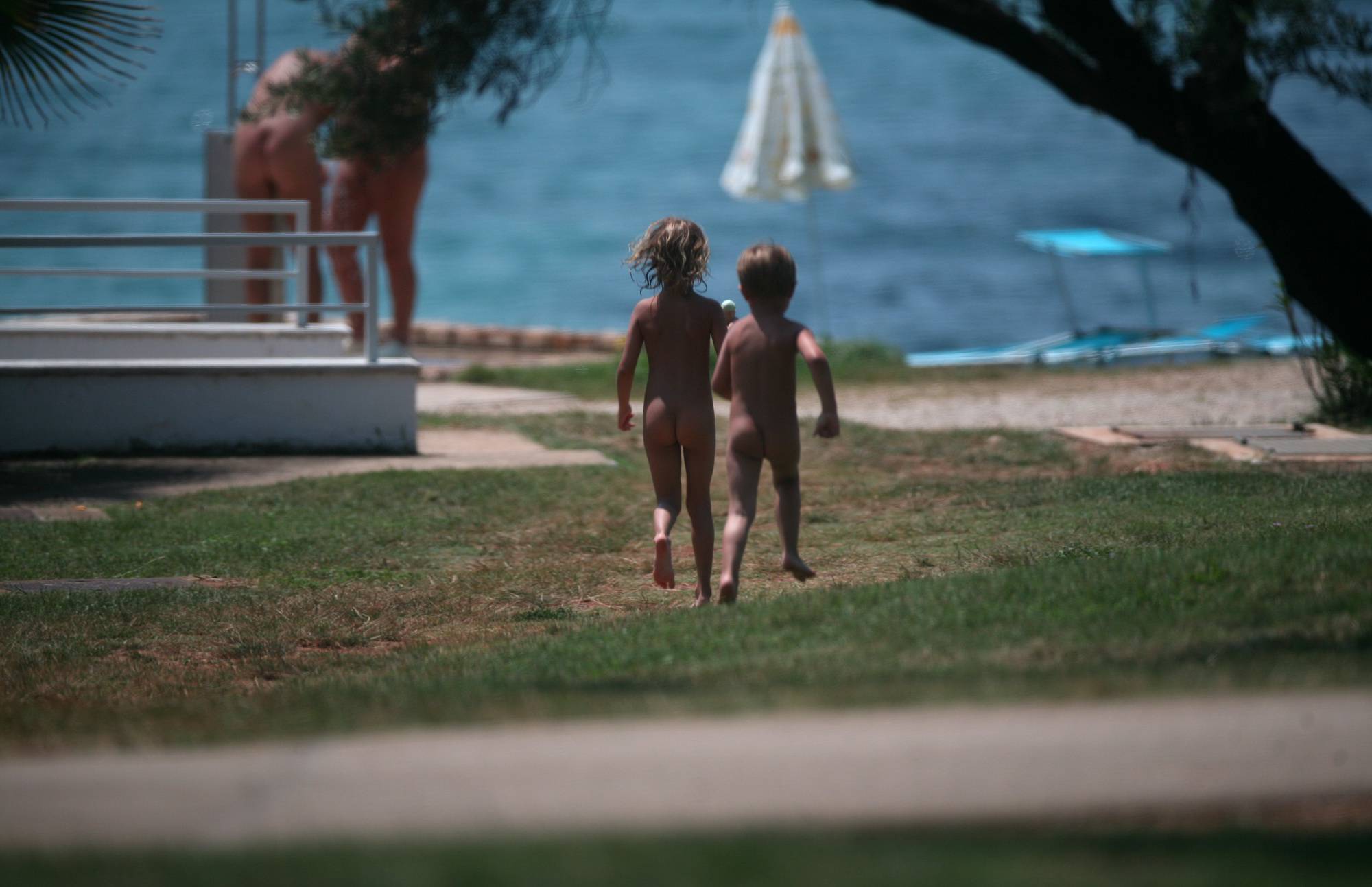 Young Nudist Girls - Two Nudist Friends Walk - 1